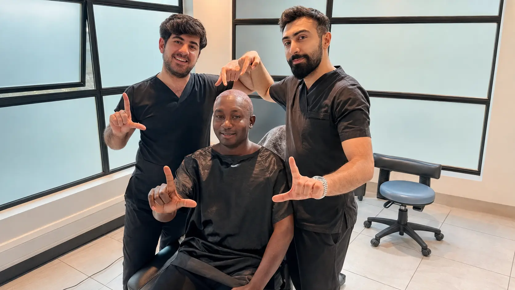 Turkish Hair Experts team with a patient after a hair transplant in Nairobi, Kenya