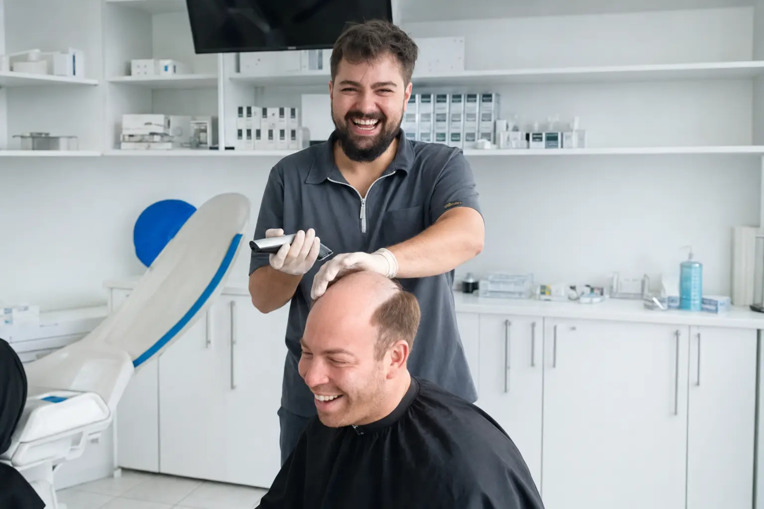 FUE donor hair extraction in a modern hair transplant clinic